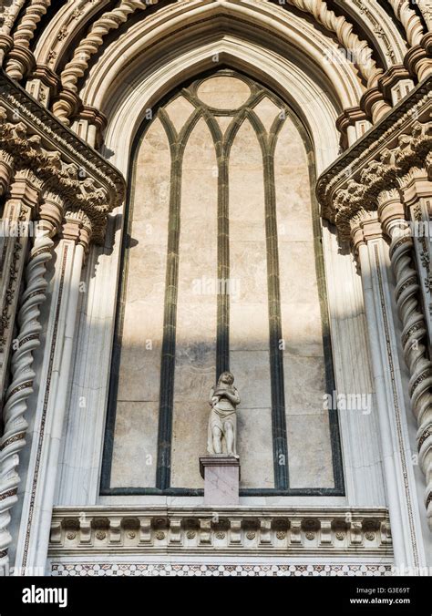 Statue Of A Man On An Ornate Wall With Twisted Columns Orvieto Umbria