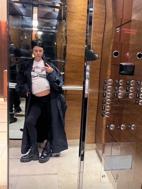 Pregnant Kourtney Kardashian shows baby bump in elevator selfie