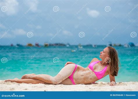 Woman Wearing Pink Bikini Laying On Beach Stock Photo Image Of