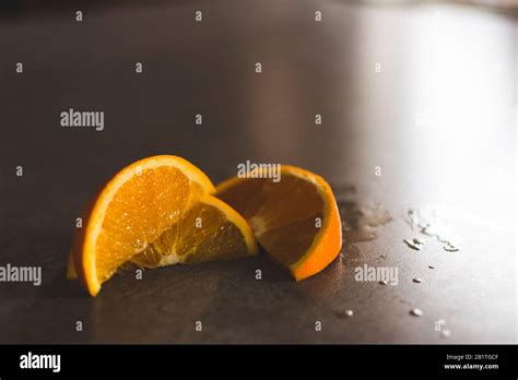 Fresh Cut Oranges On A Counter Top Stock Photo Alamy