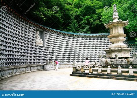 Korean People Praying the Pagoda and the Million of Rock Little Buddha in the Temple Editorial ...