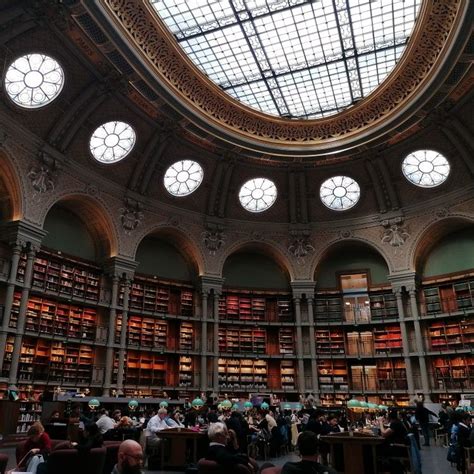 Big Oval Shaped Library Hall With A Very Tall Ceiling Three Stories