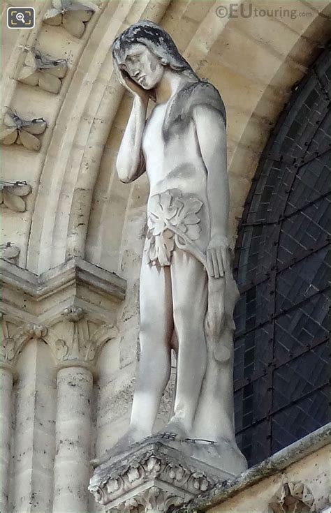 The Statue Of Adam On Notre Dame Cathedral Statue Paris Images Photo