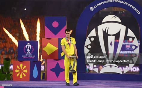 Captain Pat Cummins Holds The Cricket World Cup Trophy After News