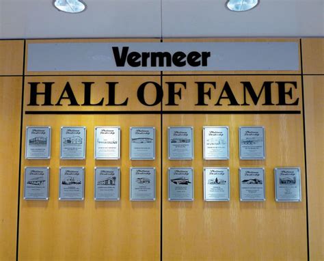 F4 Recognition Wall with Etched Plaques | Pella Engraving & Sign Company