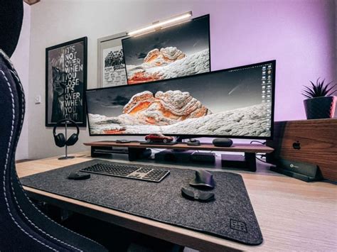 A Desk With A Computer Monitor And Keyboard On It