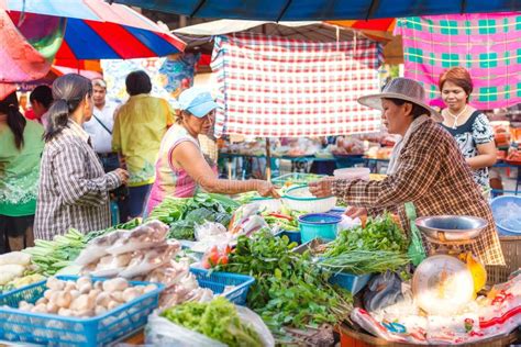 People Buy And Sell Food In The Local Market Editorial Photography