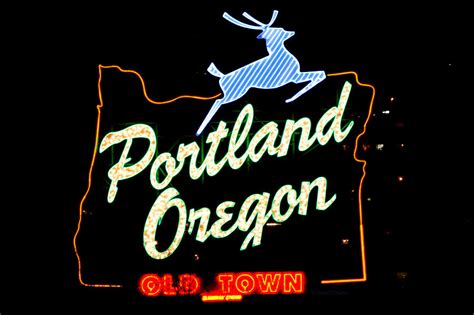 The New Portland Oregon Sign At Night With White Lights Photograph By