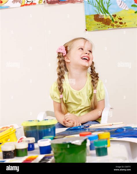 Happy Child Painting In Preschool Stock Photo Alamy