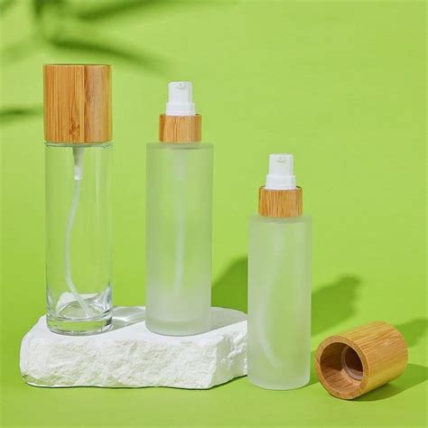 Ml Ml Glass Lotion Bottles With Bamboo Lotion Pump Manufacturers