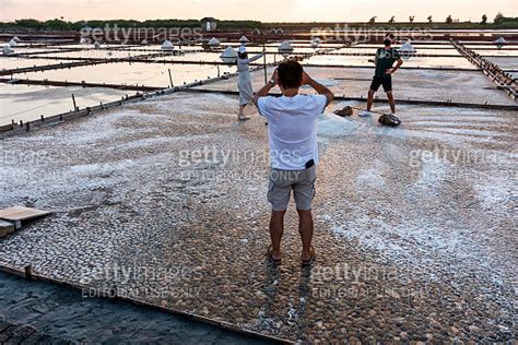 Sunset View Of The Jingzaijiao Tile Paved Salt Fields In Tainan