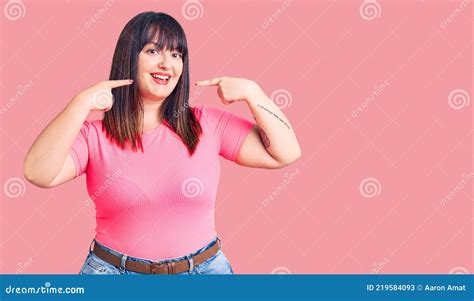 Young Plus Size Woman Wearing Casual Clothes Smiling Cheerful Showing