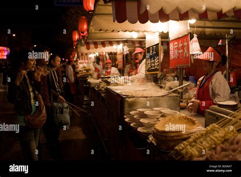 Stall Selling Meat Kebabs And Soup Dumplings In The Night Market