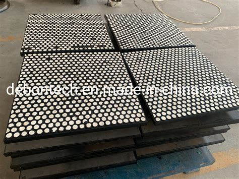 Steel Backed Composite Ceramic Wear Liners Protect Conveyor Transfer