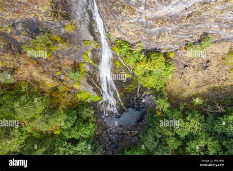 Aerial drone view of a beautiful waterfall and lake Stock Photo - Alamy