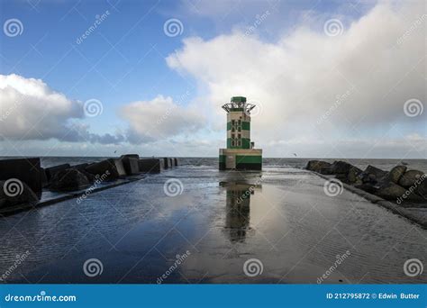 Lighthouse on the Pier of Ijmuiden in the Netherlands Stock Photo ...