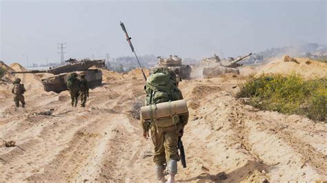 Israeli troops surround Gaza City after communications cut for third ...