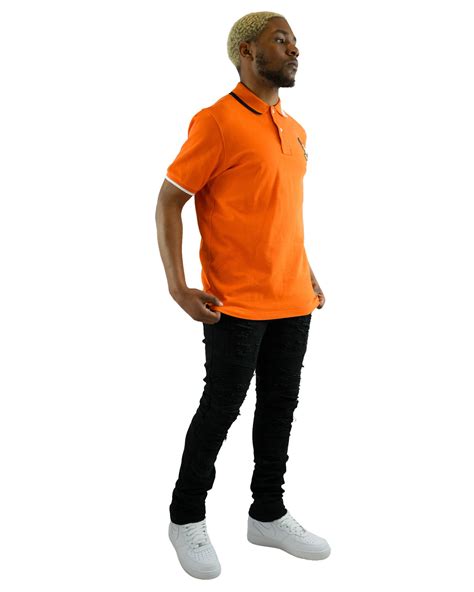 The Boondocks Huey Orange Polo Shirt The Boondocks Official