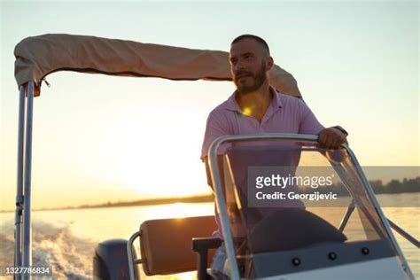 69 Man Driving Speed Boat Wearing White Outfit Stock Photos High Res