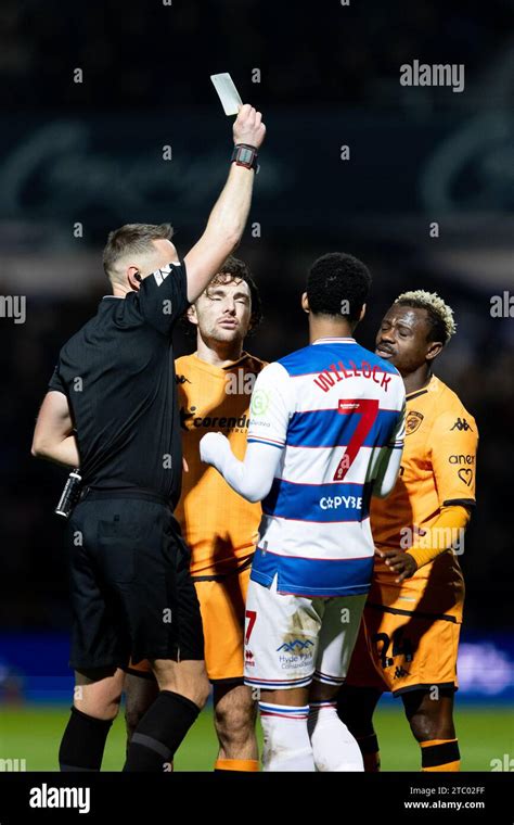 Jean Michaël Seri 24 of Hull City is shown a yellow card by match