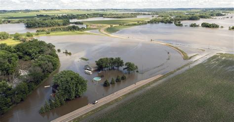 Midwest Flooding Collapses A Rail Bridge Forces Evacuations Kills At