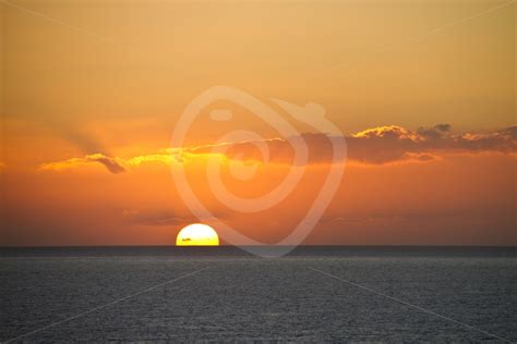 Sunset over the ocean - Nature Stock Photo Agency