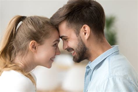 Close Up Smiling Couple In Love Touching Forehead Enjoying Tender