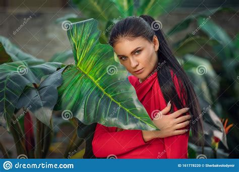 Beautiful Girl Resting And Enjoying Vacation In Tropical Forest Close