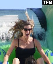 Gisele Bundchen Sexy Seen In A Hot Black Swimsuit As She Goes Down Waterslide In Miami AZNude