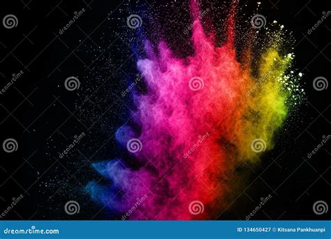 Abstract Colored Dust Explosion On A Black Background Stock Image