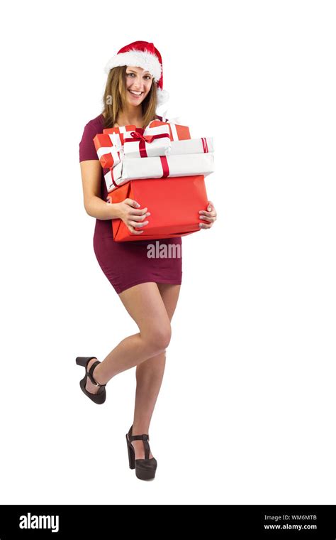 Festive Brunette Holding Pile Of Gifts On White Background Stock Photo Alamy