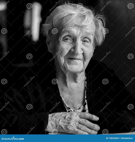 Black And White Portrait Of An Elderly Woman Happy Stock Photo