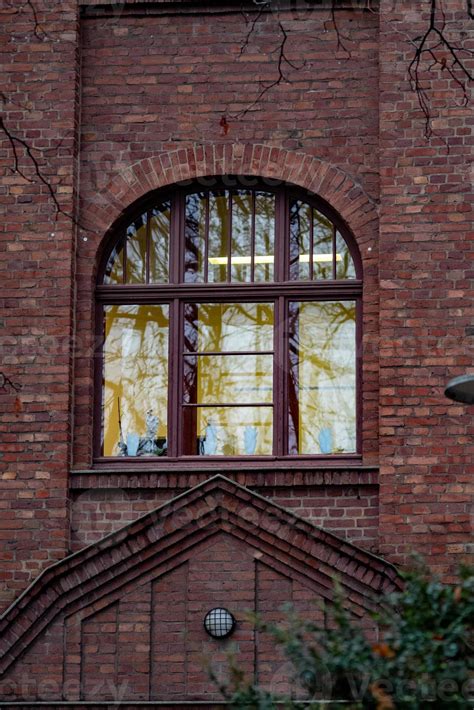 multi-piece window of an old brick industrial building 16646317 Stock