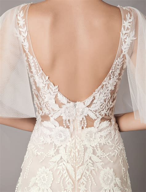 Robe de mariée bohémien ivoire en tulle col V en dentelle manche courte