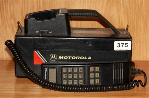 Sold at Auction: An early Motorola 4800X mobile phone, c. 1985, 26 x 19cm.