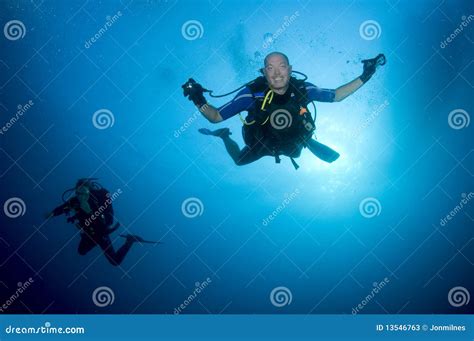 Happy Scuba Diver Beginning A Dive Stock Image Image Of Divers