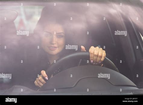 Woman Holding Hands On Steering Wheel Front View Stock Photo Alamy