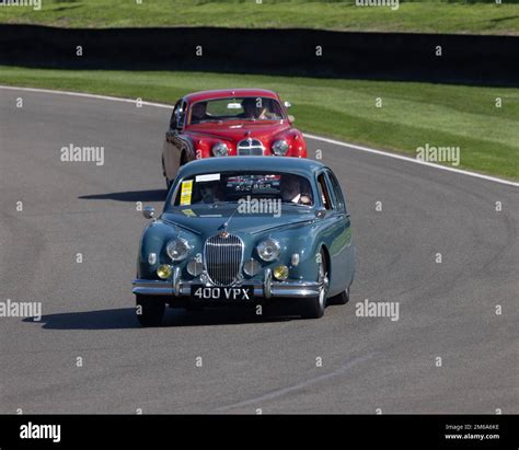 A Red 1962 Jaguar Saloon At The 2022 Goodwood Revival Stock Photo Alamy