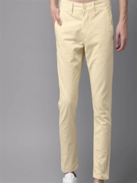 Buy Hereandnow Men Cream Coloured Slim Fit Solid Cropped Chinos Trousers For Men 2466459 Myntra