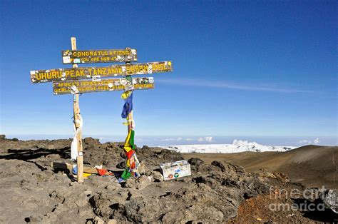 Mount Kilimanjaro summit sign in 5.895 meters with Northern Ice Fields ...