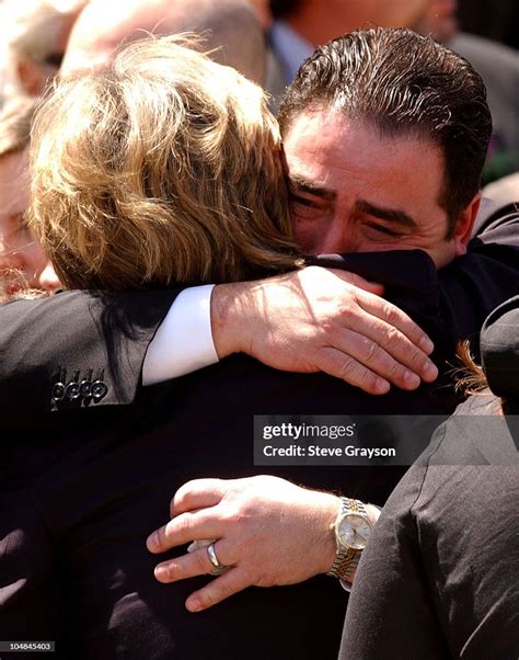 Heather Menzies, widow of actor Robert Urich is comforted by Emeril ...