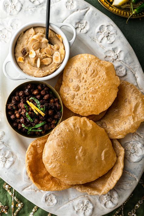 Traditional Pakistani Breakfast Halwa Puri With Aloo Ki