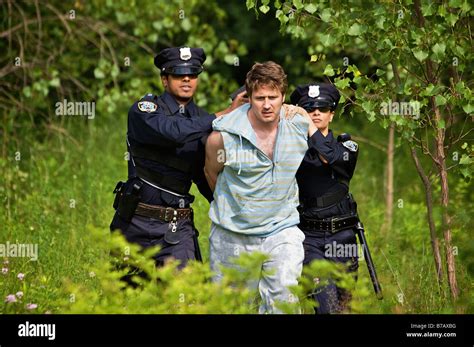 Police Officers Arresting Suspect Stock Photo Alamy