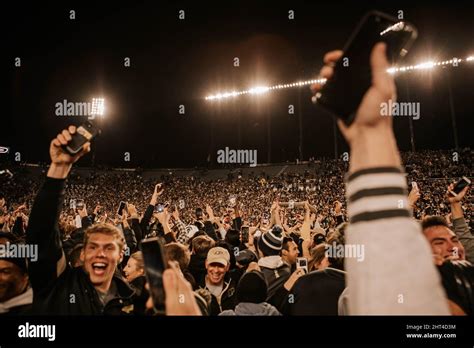 A Group Of Football Fans Cheering During The Michigan State Vs Purdue