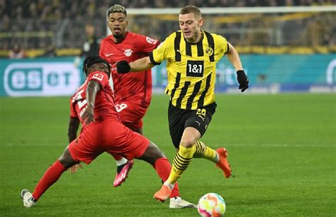 Reus And Can Send Dortmund Three Points Clear Sports