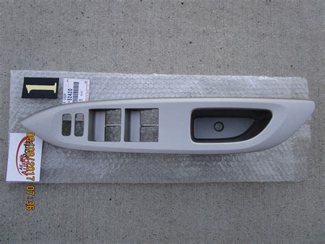 07 10 TOYOTA YARIS 4D SEDAN MASTER POWER WINDOW SWITCH BEZEL TRIM