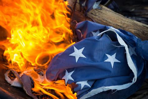 Trumps First Order Anyone Burning An American Flag To Be Charged With