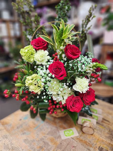 Sympathy Flower Arrangement With Red Roses In A Basket Buy In