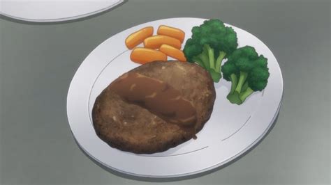 two plates with food on them, one has broccoli and the other has carrots