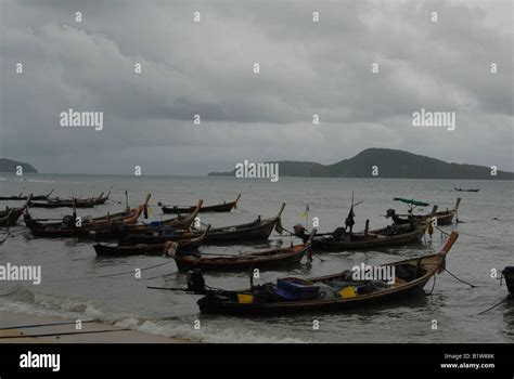 Rawai Beach Gypsy Village Fishing Boats Sunset On A Cloudy Phuket